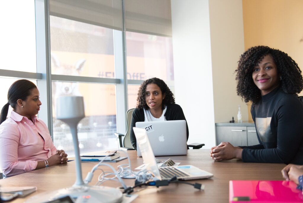 Black women meeting in a conference room