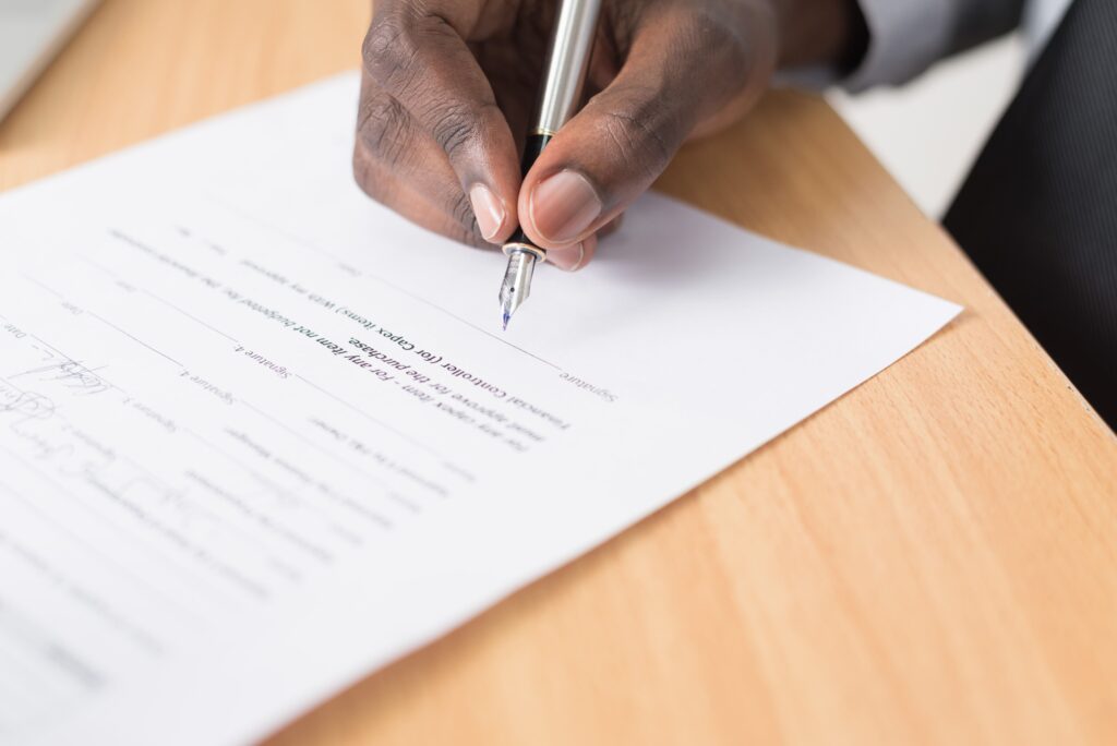Signing the sales agreement as a foreigner buying real estate in Jamaica
